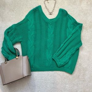 Green cable knit sweater